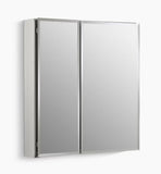Kohler 25" W x 26" H aluminum two-door medicine cabinet with mirrored doors, beveled edges